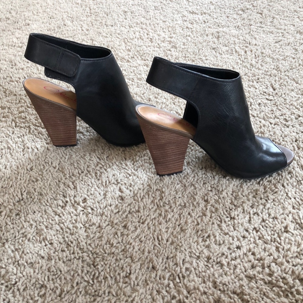 Black peep toe booties with wooden heel